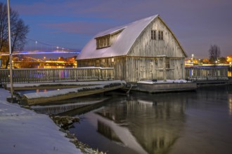 Schiffmühle illuminated winter snow ice Minden Germany