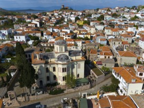 Historic church with dome in an old town full of narrow streets and red roofs, aerial view, Alibey,