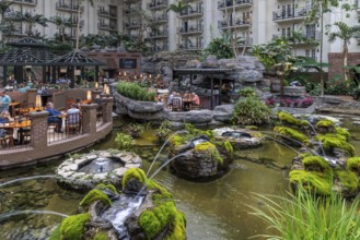 Guests dining at the Cascades American Cafe inside Gaylord Opryland Resort and Convention Center in