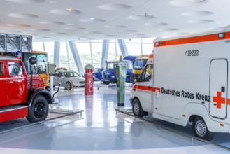 Gallery of helpers with rescue and police vehicles. The Mercedes-Benz Museum in Stuttgart presents