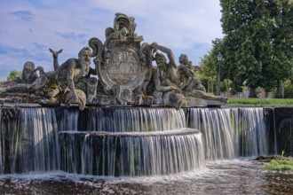 Bassin, a water basin, in front of Ludwigslust Palace, with cascades and stone figures.