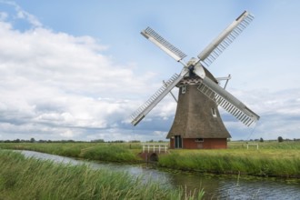 Krimstermolen on the Boterdiep canal, Poldermühle, Zuidwolde, province of Groningen, Netherlands