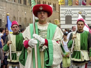 Il Palio di Siena, historical horse race, flag bearer of the Contrada dell Oca, goose, parade in