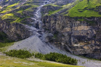 Waterfall cascading down a rock face, Zinal Valley, Val d'Anniviers, Valais Alps, Canton Valais,