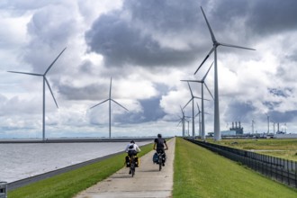 Strekdammen Wind Farm, wind farm at the seaport of Eemshaven in the Netherlands, left, built on