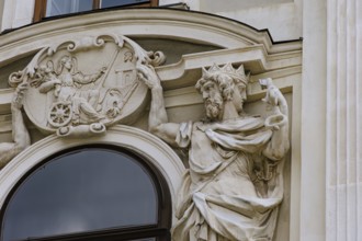 Jupiter and Janus holding a relief of Fortuna, sculptural relief on the façade of St Michael's Wing