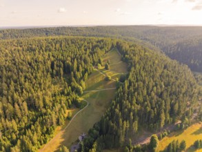Wide nature view with forests, meadows and sunlight, Retro Freizeitpark Poppeltal Riesenrutschbahn,