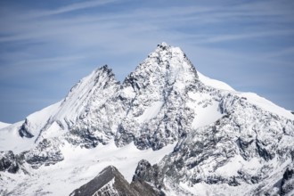 Summit of the Großglockner with snow, view from the summit Böses Weibl, Schober group, Hohe Tauern