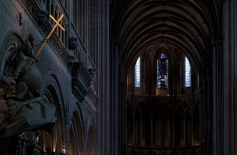 Interior view, angel on pulpit, holding a shining golden sword, Cathédrale Notre-Dame de Bayeux,