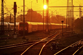 Travelling trains at sunrise, Central Station, Dortmund, Ruhr Area, Germany