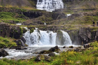 Dynjandi, Dynjandifoss or Fjallfoss, tourists, hikers at the waterfall in summer, river Dynjandisá,