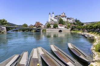 Aarburg town on the River Aare with church, fortress and boats in Aarburg, Switzerland
