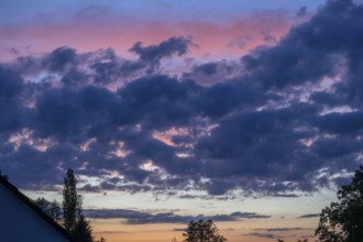 Rain clouds (Nimbostratus) in the evening, Bavaria, Germany