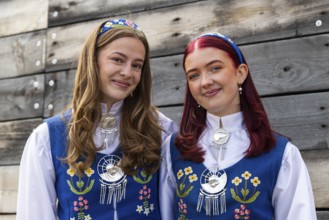 Young woman in traditional traditional costume at the reception for King Harald at the end of coal