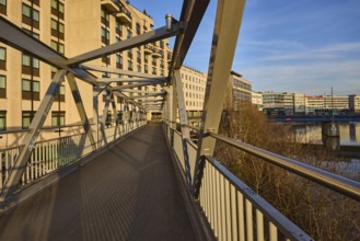 Modern architecture, footbridge, metal railing, river Saar, blue sky, cirrostratus clouds, evening