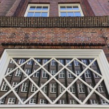 Reflection of the façade of the Sprinkenhof, Brick Expressionism, Kontorhausviertel, UNESCO World