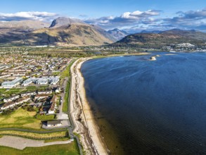 View of Caol Beach and Nevis Range Mountains from a drone, Corpach, Fort William, Highland,