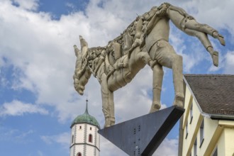 Monument: The trial of the donkey's shadow, created by the artist Peter Lenk, market square,
