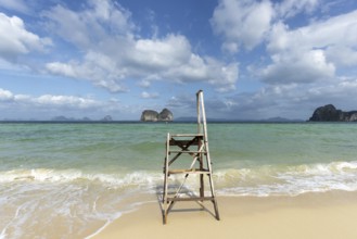 A lonely boarding and disembarking ladder for longtail boats on the beach of Koh Ngai Island,