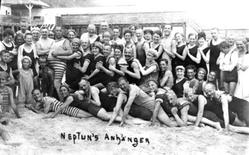 Large bathing group, 1930s, Large group of people in swimwear smiling on the beach, Historical