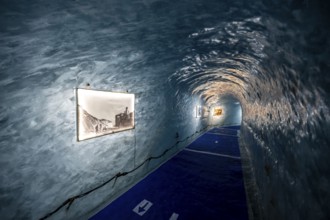Artificial ice cave through the glacier ice, Mer de Glace, Montenvers, Chamonix, Haute-Savoie,