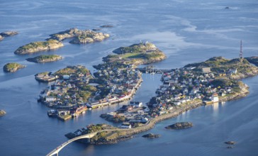Houses on small rocky islands in the sea, view of Henningsvær, Vågan, Lofoten, Nordland, Norway