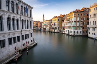 View of the Grand Canal at sunset, long exposure, picturesque evening mood with palazzos on the