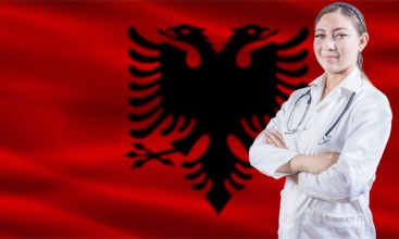 Female doctor on Albania flag. Doctor with crossed arms on Albania flag. Albania health and care
