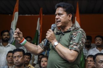 Bhupen Kumar Borah, president of Assam Congress committee speaks during celebrate after Indian