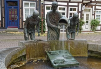 The asparagus fountain in Mühlenstraße, a historical sight in the old town centre of Nienburg an