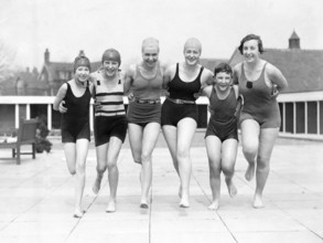 Group of woman in swimwear on a jetty, 1930s, woman in swimming costumes smiling and posing happily