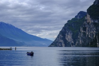 Fisherman, fishing boat near Riva del Garda, Lake Garda, Trentino, Trentino-Alto Adige, IItaly