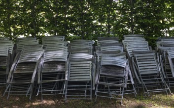Stacked chairs in the spa gardens, spa town, Bad Hall, Traunviertel, Upper Austria, Austria