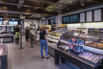Guests shopping for coffee, food, and snacks at the Starbucks in Gaylord Opryland Resort and