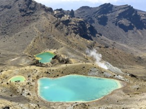 On the hiking trail of the Tongariro Alpine Crossing in Tongariro National Park with a view of the