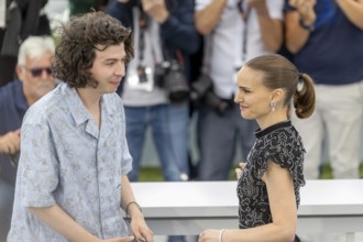 Cannes, France - 16.5.2024: Ugo Bienvenu, Natalie Portman during the ARCO Photocall at the 78th