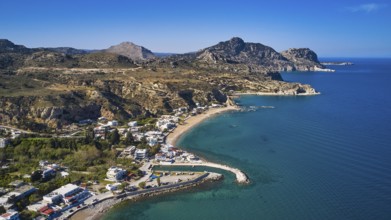 Aerial view of a coastline with beaches and mountains in the background, Stegna Beach, Stegna