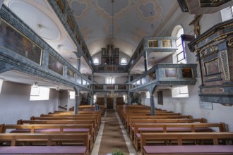 Interior with organ gallery and surrounding double galleries, historic Evangelical Lutheran