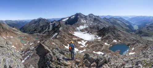 Mountain panorama, mountaineer in rocky high mountain landscape at the Rotgratscharte, view of