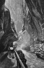 Mountain scene from the 19th century in Switzerland, hikers in a gorge, Alps, digital reproduction