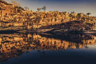 Bell Gorge waterfall, a body of water in north-west Australia in the Kimberley. Sunrise in the