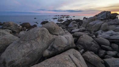 Sunset, rocky coast near Porto Pollo, Corsica, France