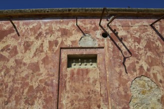 Lost Place, Old electrical installation in a weathered red brick wall with cables, Radio Station,