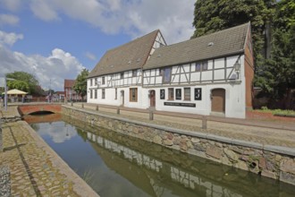Bridge over the Grube canal with historic half-timbered house, Frische Grube, Wismar,