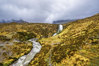 Eas a' Bhradain waterfall, Red Cuillin mountains, Loch Ainort, Isle of Skye, Scotland, UK