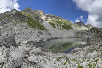 Koblatsee, a small mountain lake on the Koblat-Höhenweg in the nature reserve of the Allgäu High