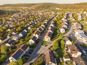 Residential area with terraced houses in a green landscape and hilly surroundings, Nagold, Black