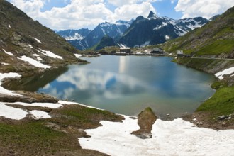 View from Swiss territory to Italian territory over mountain lake Lac du Grand Saint Bernard on top