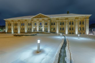 Historic military hospital illuminated winter snow Minden Germany