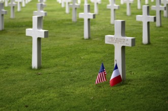 US flag and French flag at the grave of John S Brannon jr, gravestones, war graves, military